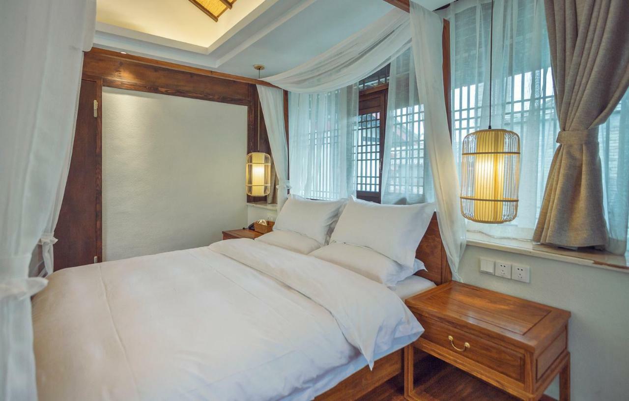 Lijiang Qilu Garden Hotel Baisha  Экстерьер фото